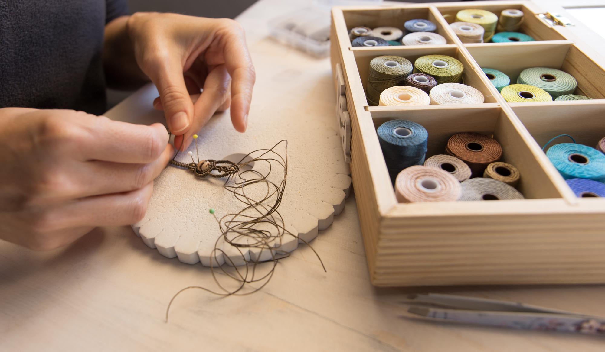 Studio table with threads and hoops